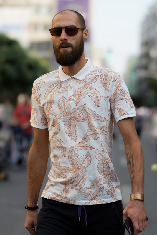 18 - Bearded man with a white and orange patterned LCW Vision slim-fit cotton polo shirt